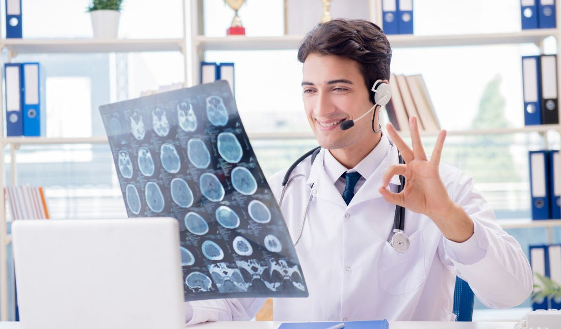 Doctor with headset holding brain scan X-ray, telemedicine consultation in office