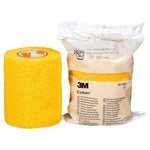 3M Coban self-adherent bandage in yellow, 7.5cm x 4.5m, shown unwrapped with flexible, stretchy fabric for secure wound support