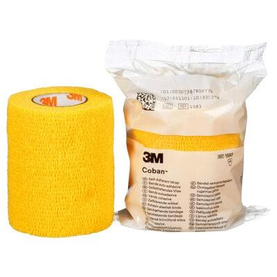 3M Coban self-adherent bandage in yellow, 7.5cm x 4.5m, shown unwrapped with flexible, stretchy fabric for secure wound support