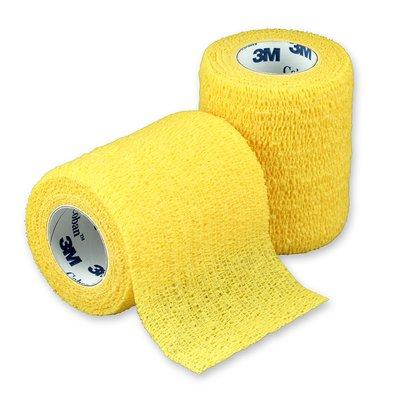 Yellow 3M Coban self-adherent bandage, 7.5cm x 4.5m, shown wound-adhesive medical wrap for compression and support.