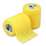 Yellow 3M Coban self-adherent bandage, 7.5cm x 4.5m, shown wound-adhesive medical wrap for compression and support.