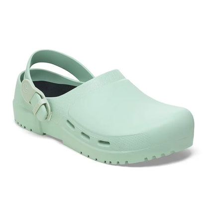 Mint green medical clog with ventilation holes and adjustable heel strap, non-slip sole