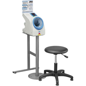 A&D Medical TM-2657P upper arm blood pressure monitor with cuff, designed for waiting room use, displayed on a table.