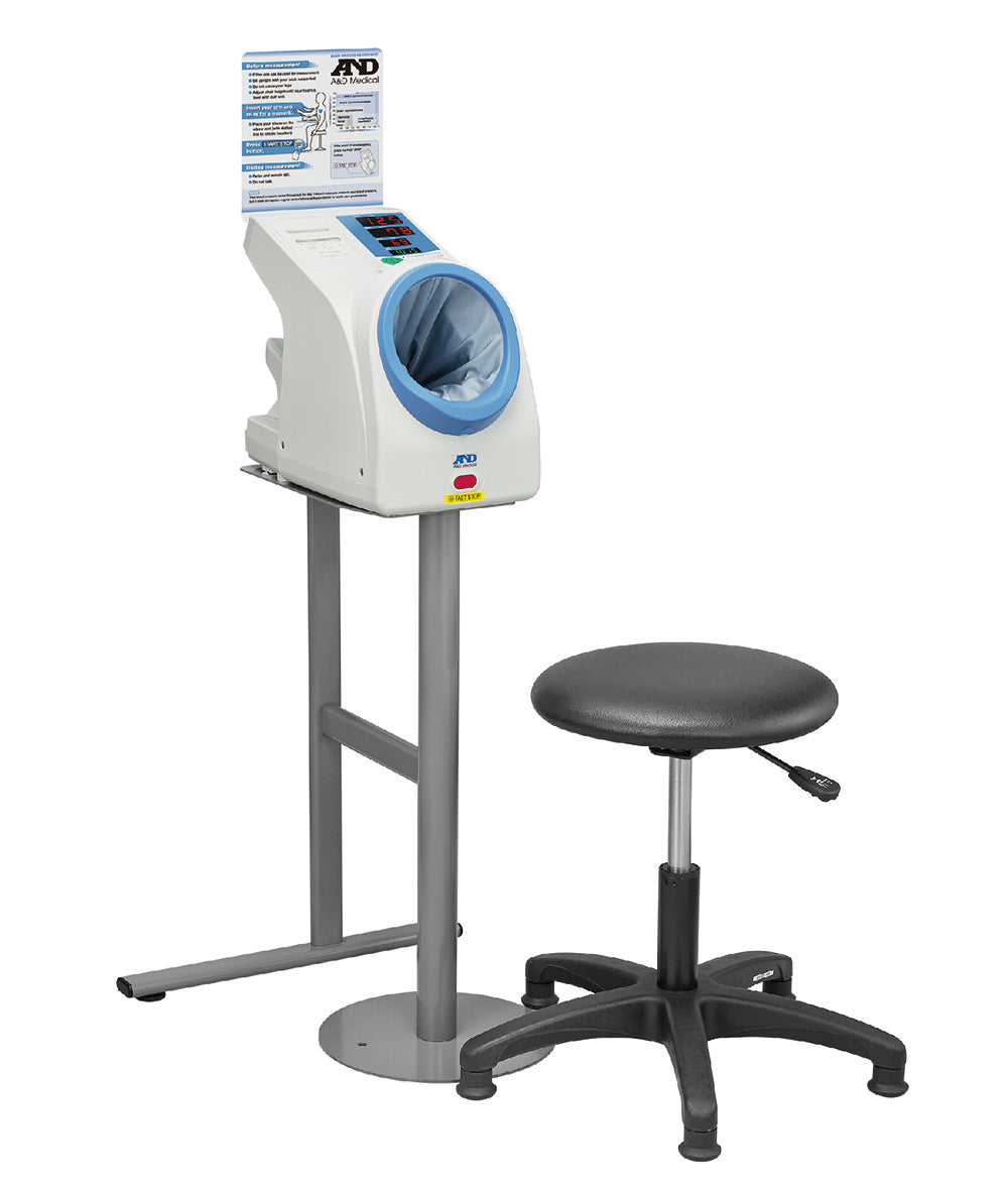 A&D Medical TM-2657P waiting room upper arm blood pressure monitor with stand and chair, ready for patient use.