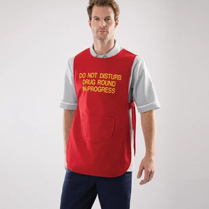 Alexandra drug round tabard with front pockets, lightweight fabric, and adjustable neck strap, designed for healthcare professionals.