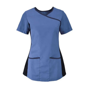 Woman's Alexandra stretch mock-wrap scrub top with V-neck and short sleeves, featuring a fitted design and front pockets.