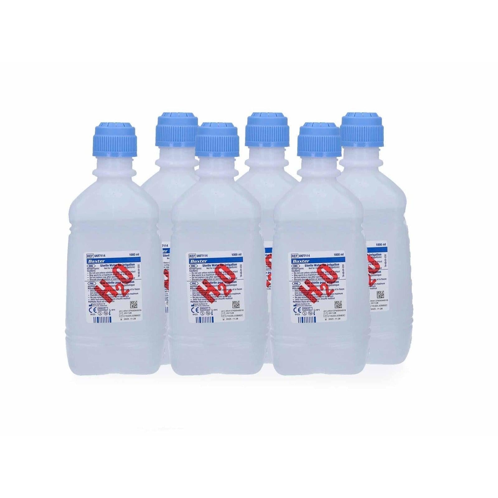 Six 1-liter bottles of Baxter sterile water shown in clear plastic packaging, suitable for medical or laboratory use.