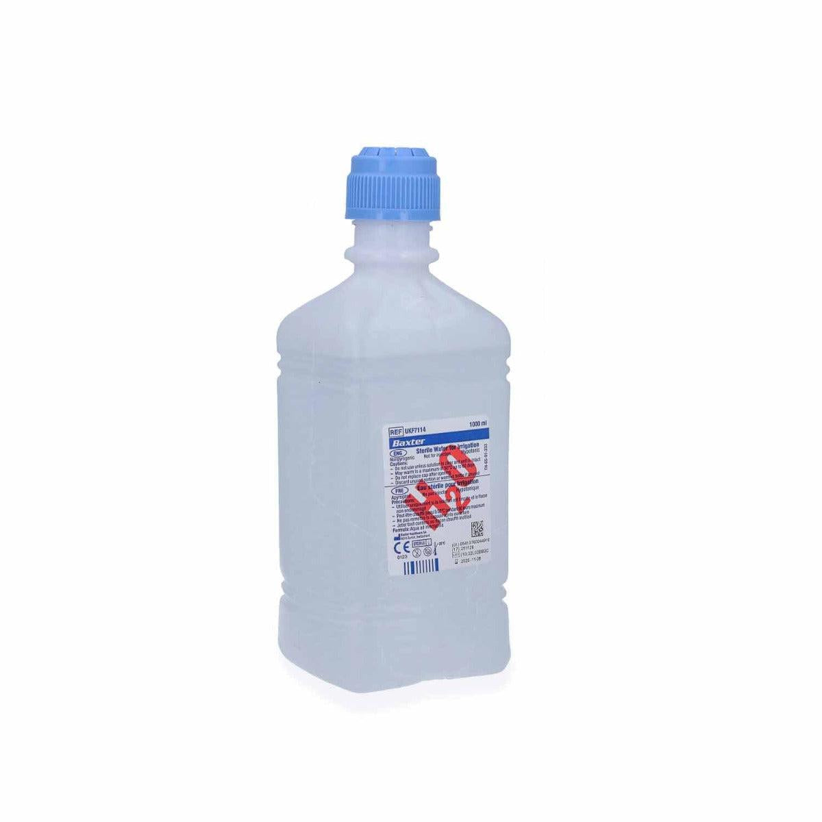 Six 1-liter bottles of Baxter sterile water, clear plastic containers, arranged in a pack for medical or laboratory use.