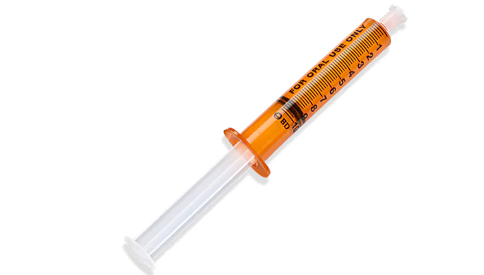Becton Dickinson BD™ 10ml amber oral syringe with tip cap, non-sterile, shown in box of 100 for precise medication dispensing