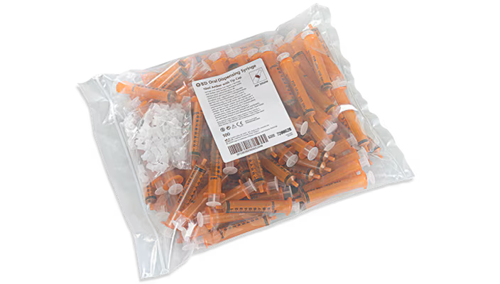 Becton Dickinson BD 10ml amber oral syringe with tip cap, non-sterile, shown in packaging, box of 100 syringes