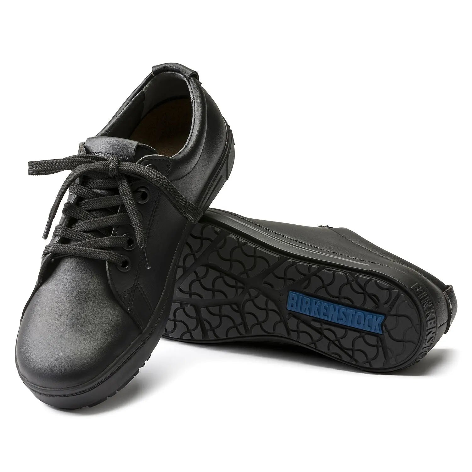 Birkenstock QO 500 lace-up shoes in microfiber with brown leather accents and sturdy sole, displayed on a plain background.