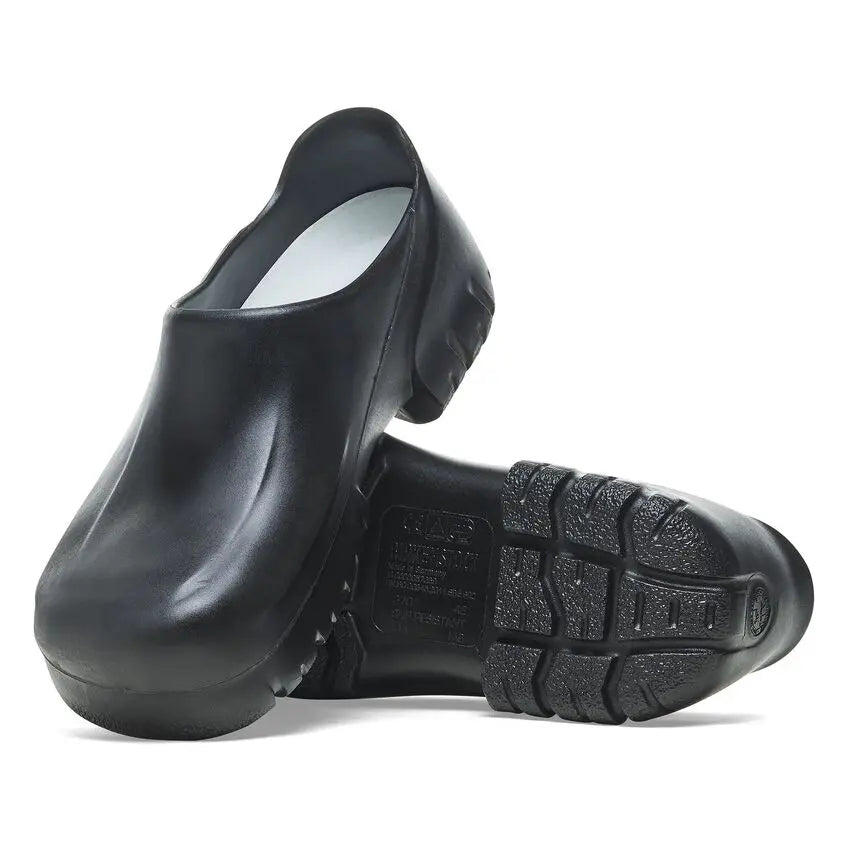 Black slip-resistant hospital clogs with textured soles, ideal for medical professionals.