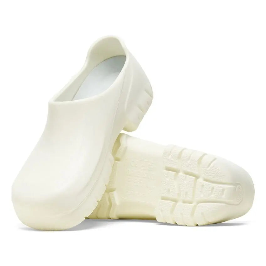 Pair of white medical clogs with slip-resistant soles, suitable for healthcare professionals