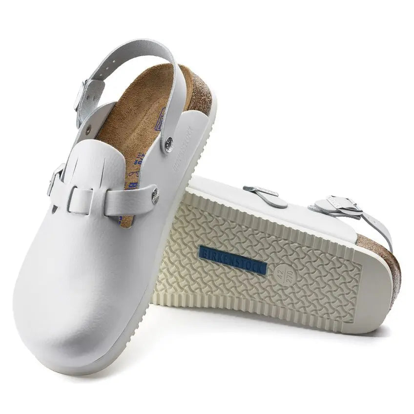 White leather soft footbed clogs with adjustable straps and textured non-slip sole