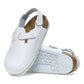 White leather medical clogs with slip-resistant soles and adjustable backstrap