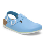 Light blue medical clog with adjustable strap, white sole, and ergonomic cork footbed