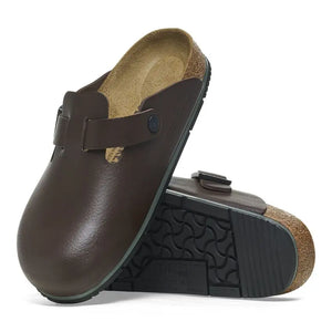 Birkenstock Boston PRO footwear featuring black leather clogs with adjustable strap and cushioned footbed.
