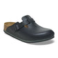 Black slip-on medical clog with buckle and ergonomic cork footbed, side view