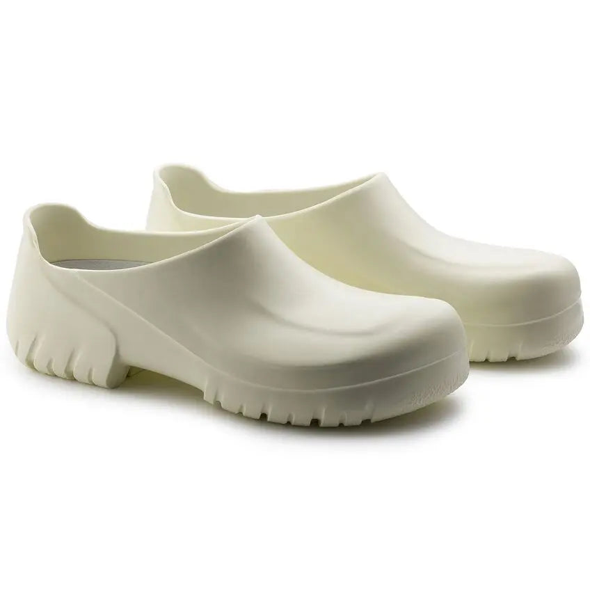 Pair of white medical clogs with slip-resistant soles for healthcare professionals
