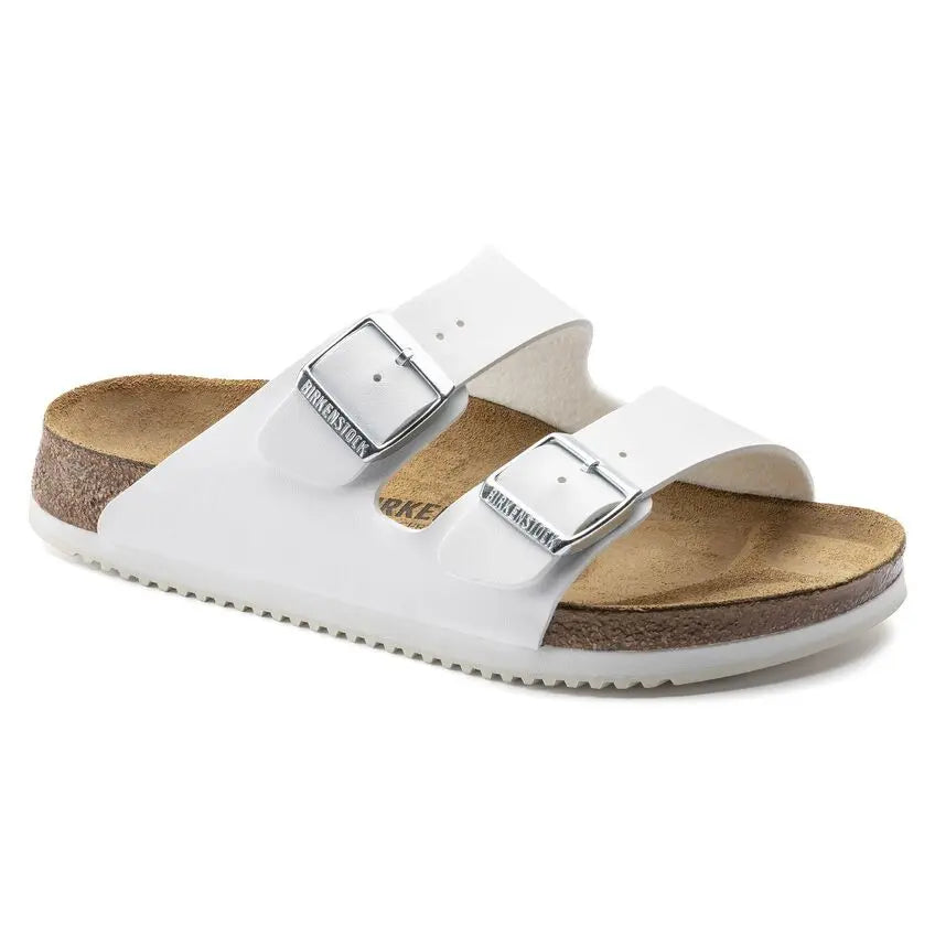 White slip-on sandal with two adjustable buckle straps and a cork footbed, side view.