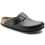 Birkenstock Boston Super Grip footwear with textured sole, beige suede upper, and supportive slip-on design for comfort and stability.