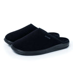 Black slip-on slippers with closed toe and rubber sole for indoor comfort
