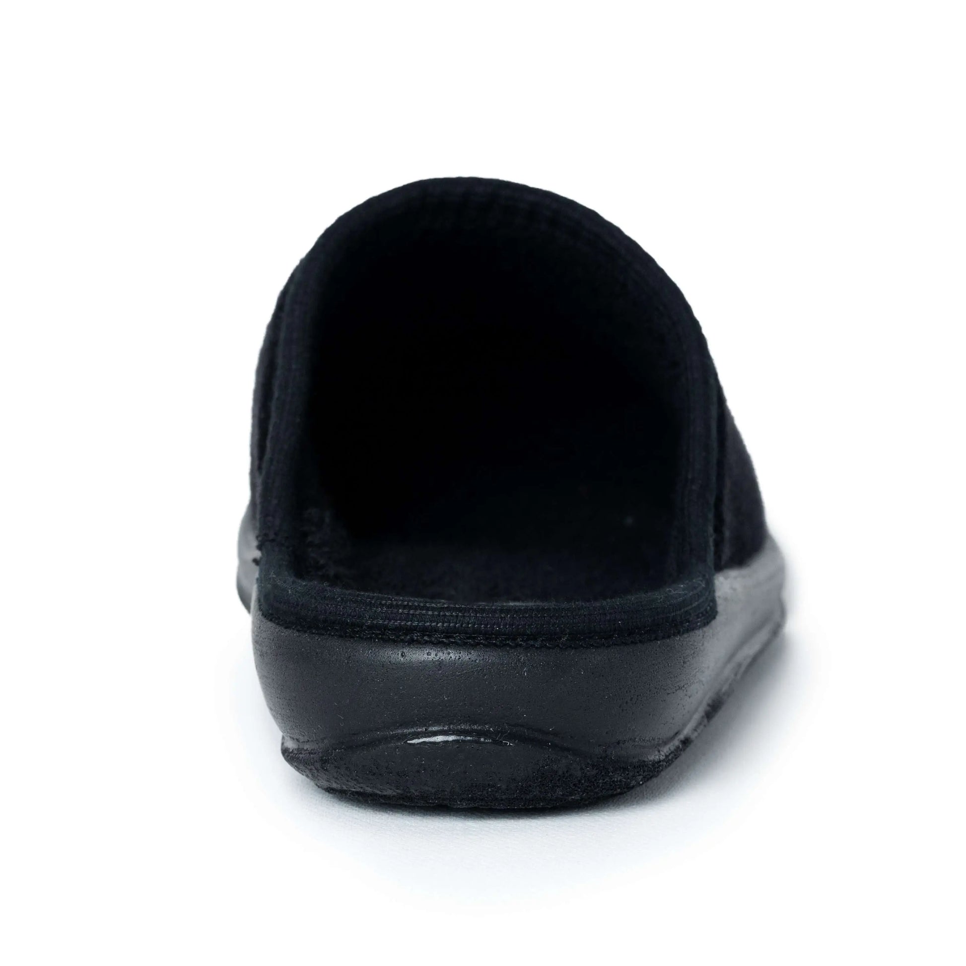 Black slip-on medical slipper with rubber sole, rear view on white background