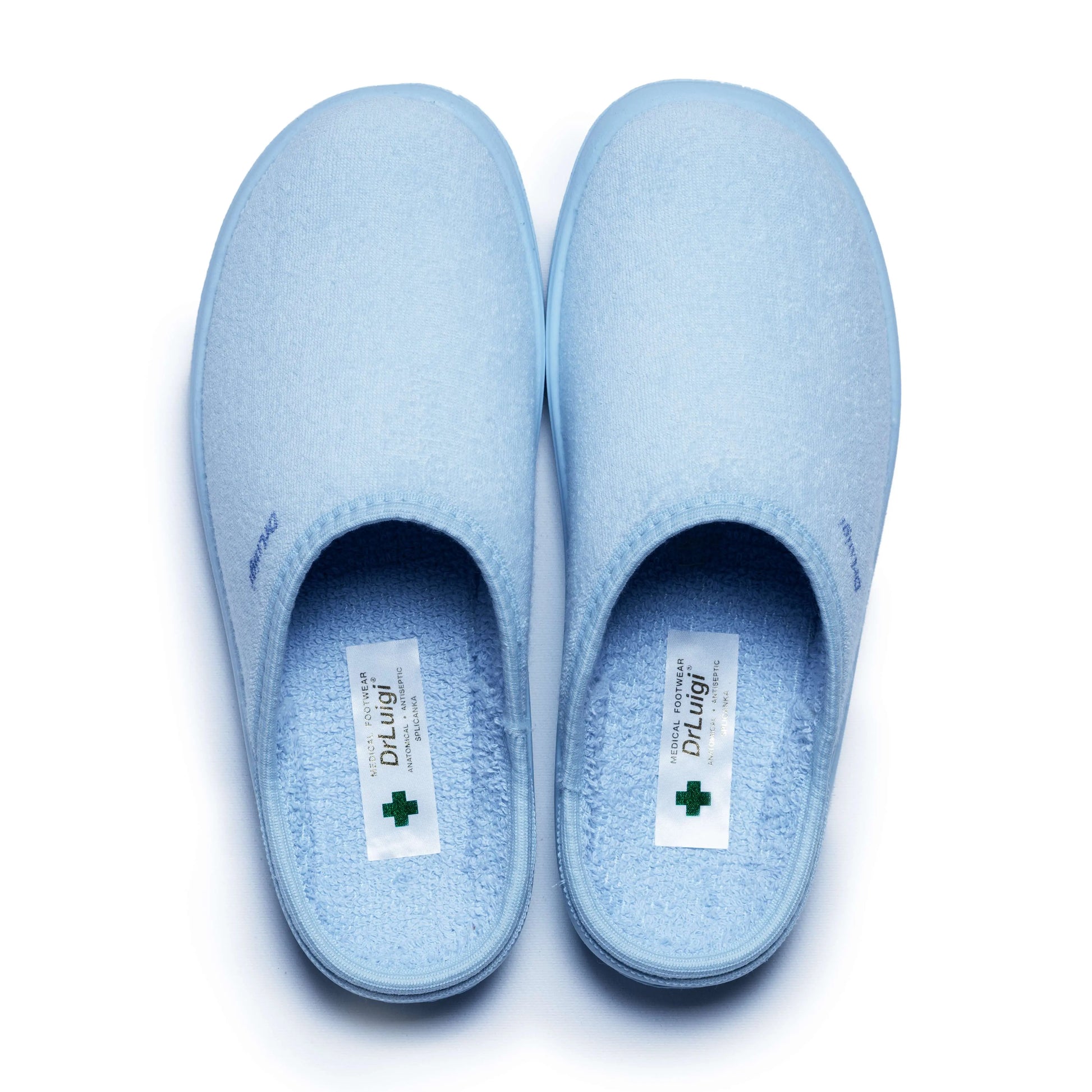 Light blue medical comfort slippers with soft interiors, closed toe, Dr. Luigi label visible