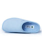Light blue medical slipper with soft fabric and closed toe design on white background