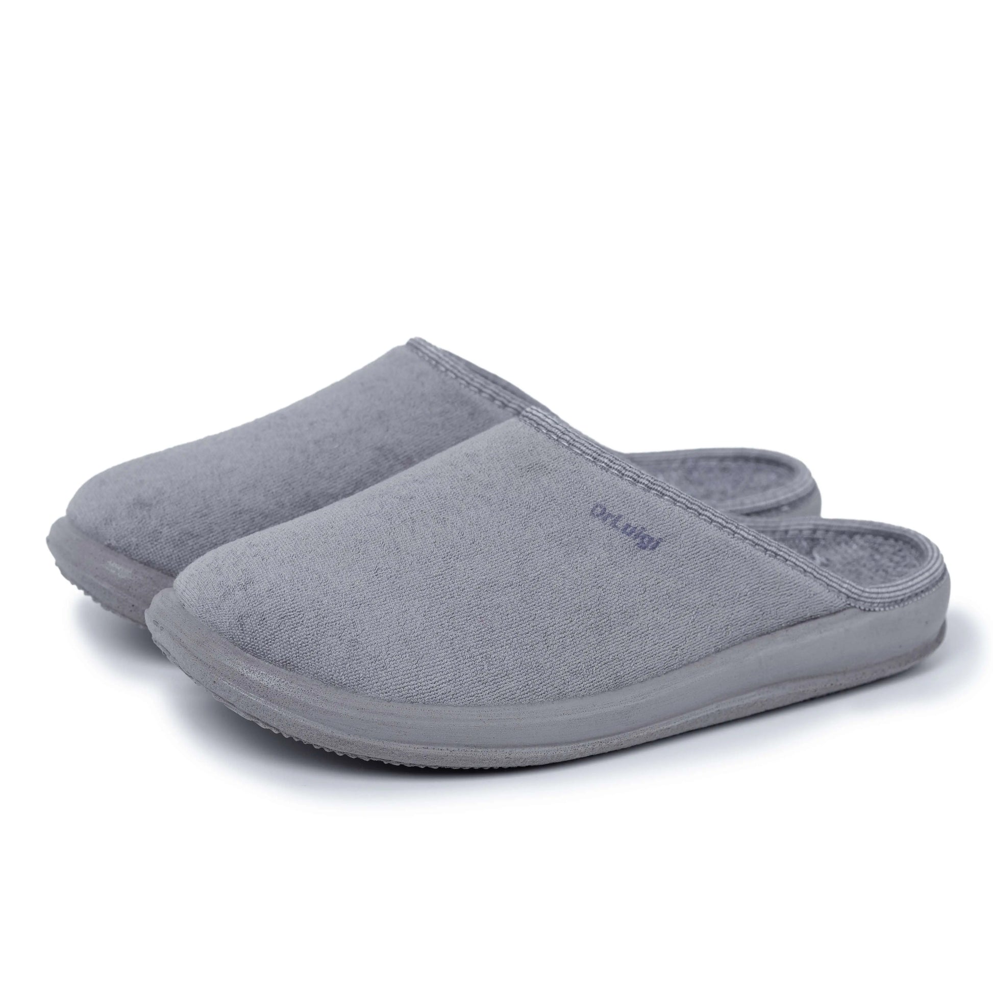 Pair of grey closed-toe medical slippers with rubber soles on white background