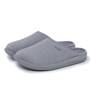 Pair of grey closed-toe medical slippers with rubber soles on white background