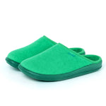 Pair of green closed-toe slippers with rubber soles on white background