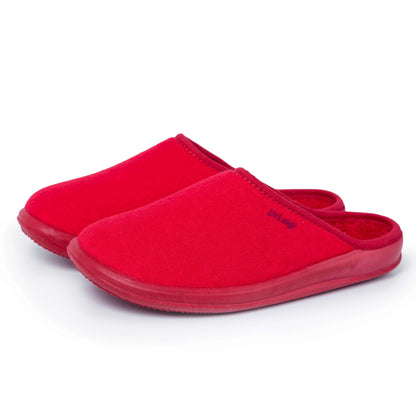 Pair of red slip-on slippers with closed toe and soft rubber sole on white background