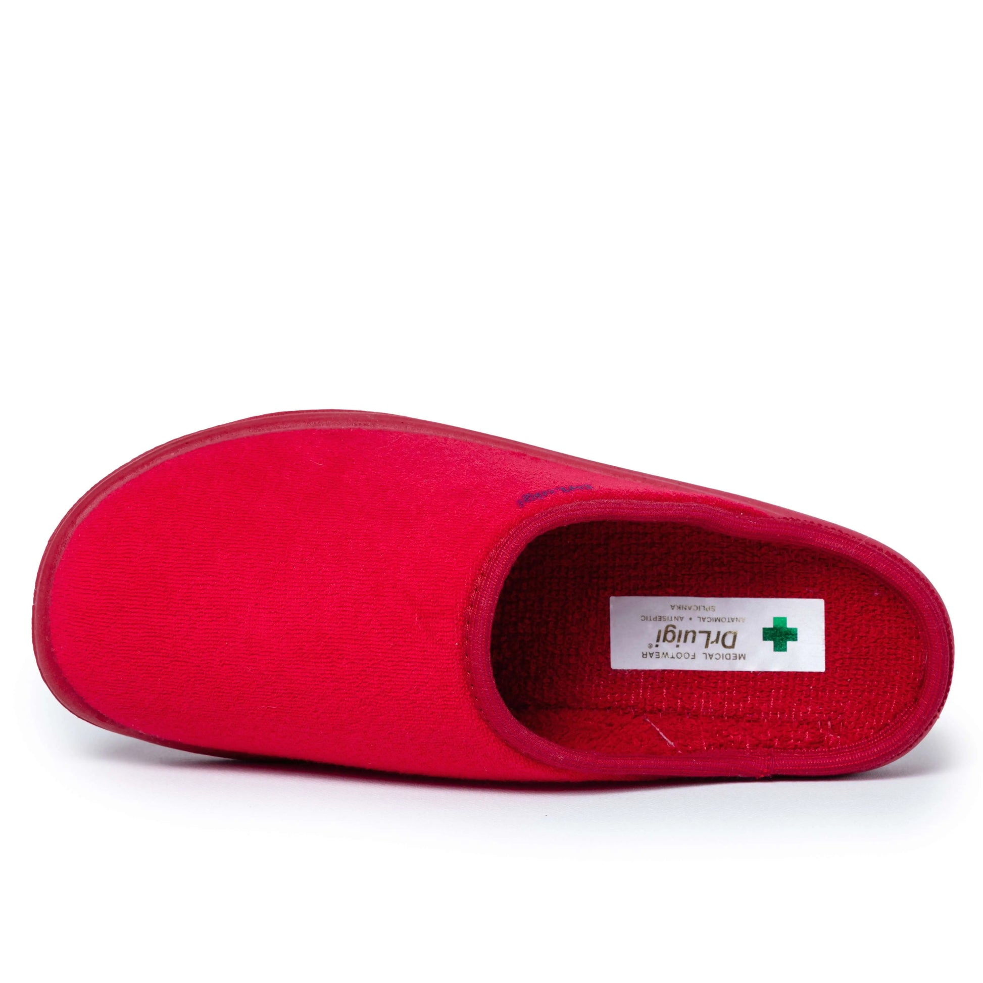 Red medical slipper with closed toe, soft fabric and healthcare label on white background