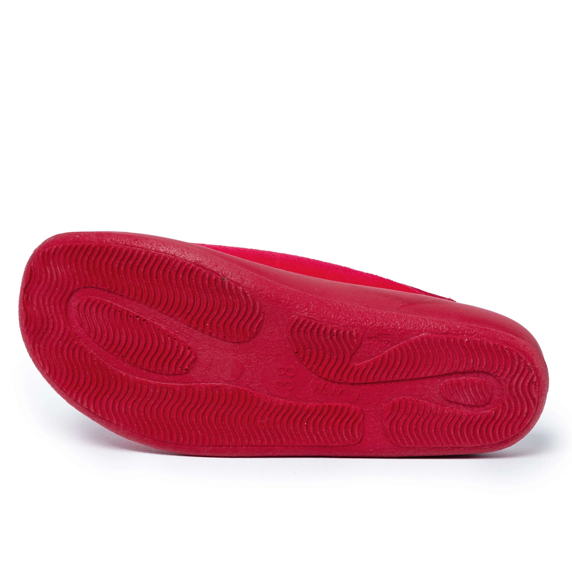 Red non-slip rubber sole of a medical slipper for healthcare professionals