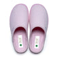 Pair of pink medical slippers with closed toes, soft fabric, and Dr. Luigi label visible inside