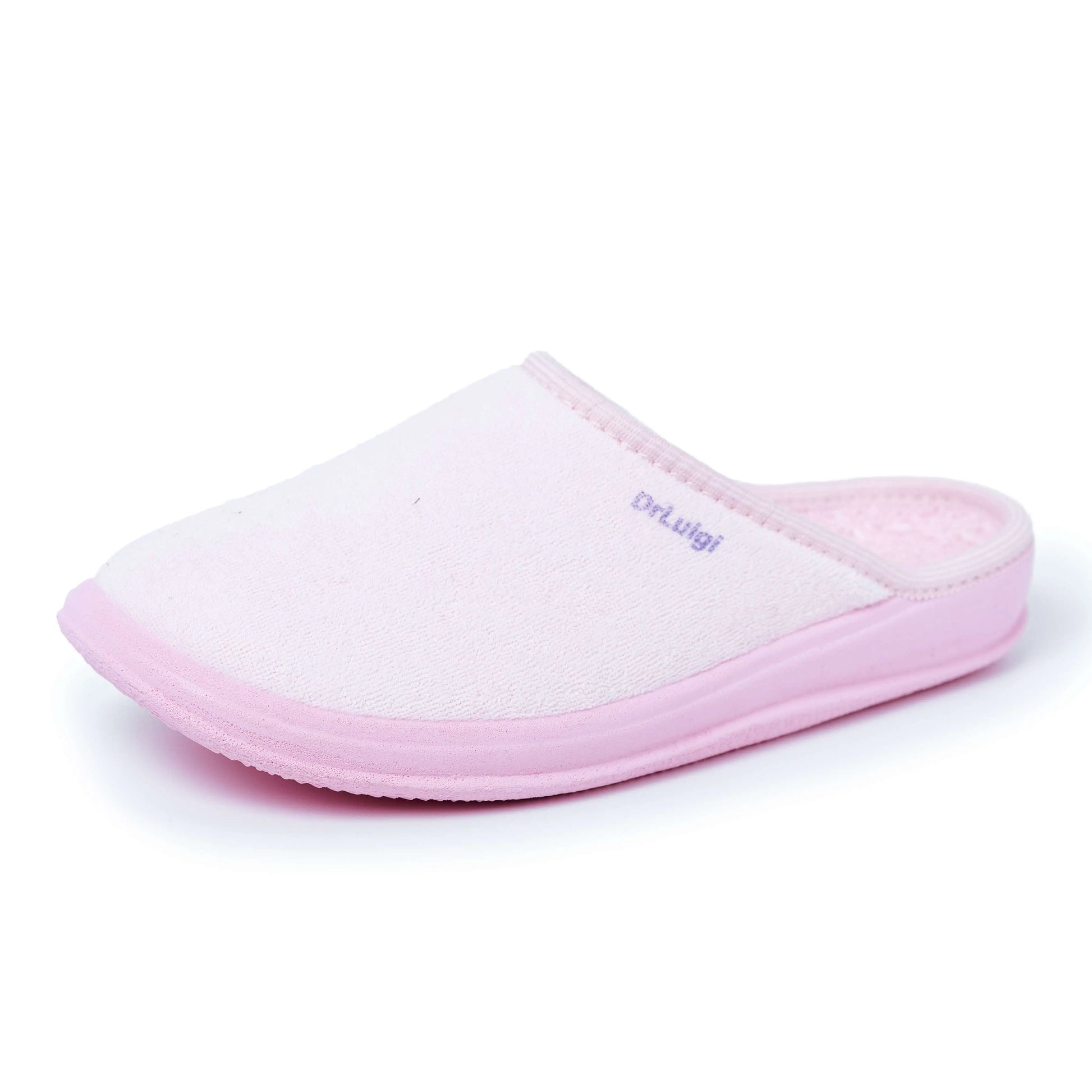 Light pink medical comfort slipper with closed toe and soft cushioned sole, side view