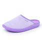 Light purple orthopedic slipper with soft fabric and supportive sole, side view