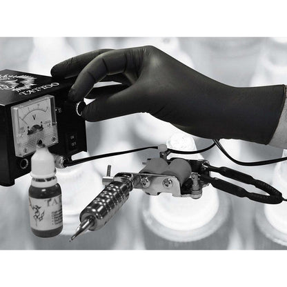 Black box of 100 HPC nitrile powder-free medium gloves, showing the packaging and gloves inside.