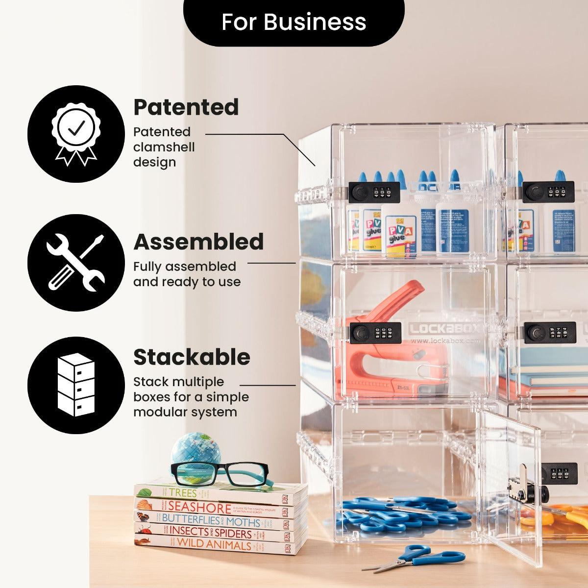 Clear Lockabox One™ Crystal plastic lockable storage box with a secure lid, shown on a flat surface.
