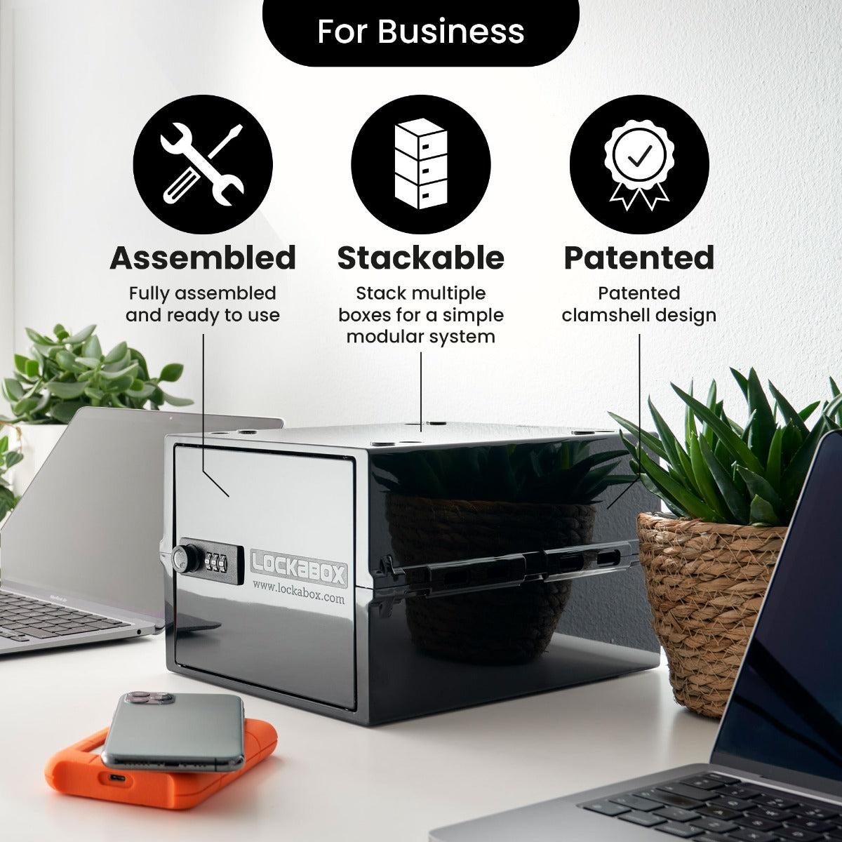 Lockabox One Jet portable lockable storage box with sleek black design, secure latch, and compact size for travel and storage.