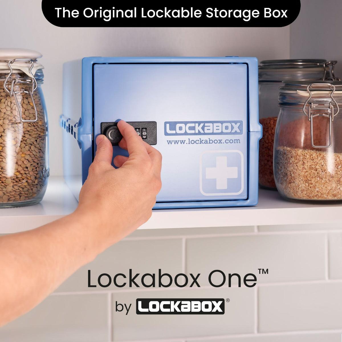 Lockabox One™ Medi Blue plastic lockable storage box with transparent sides and blue lid, designed for secure storage.