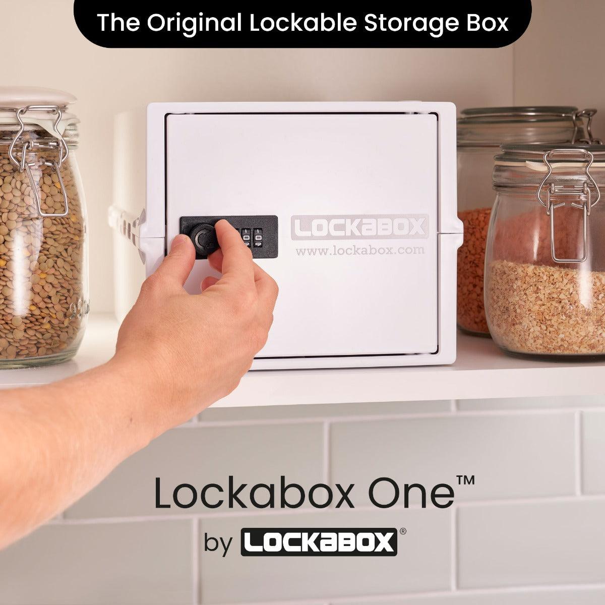 Lockabox One™ in Opal White, a compact lockable storage box with a clear lid and white body, designed for secure organization.