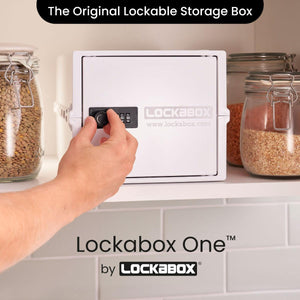 Lockabox One™ in Opal White, a compact lockable storage box with a clear lid and white body, designed for secure organization.
