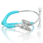 Acoustica® MDF Instruments pastel blue stethoscope with flexible tubing and dual-head chest piece, lying on a white surface.