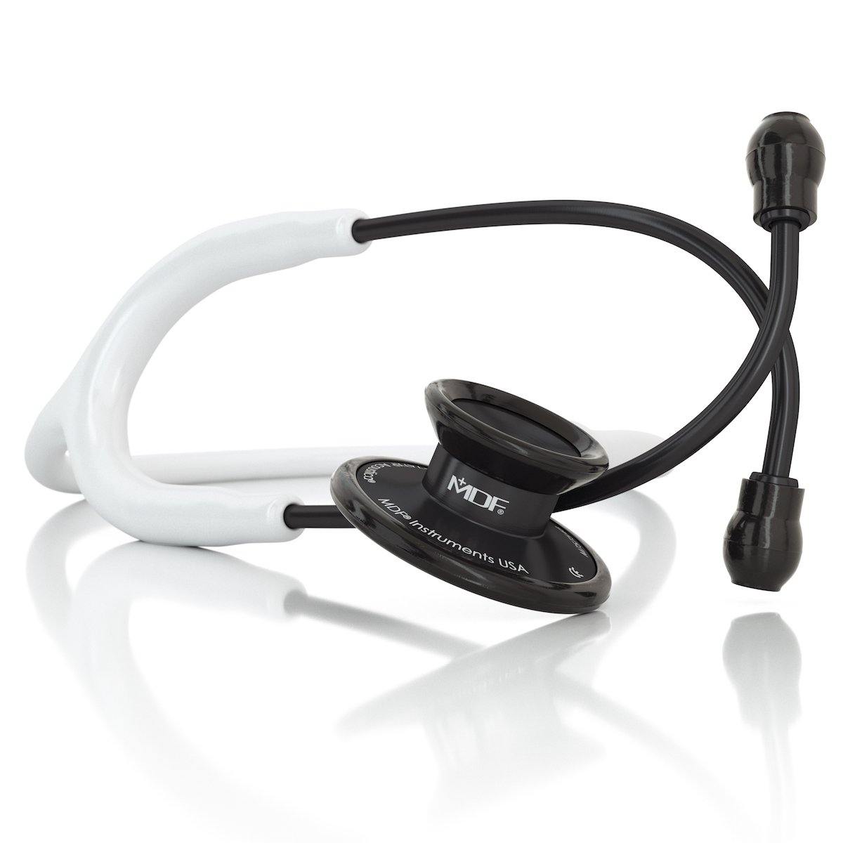 Acoustica MDF Instruments white and black stethoscope with dual-head chest piece and flexible tubing, designed for medical professionals.