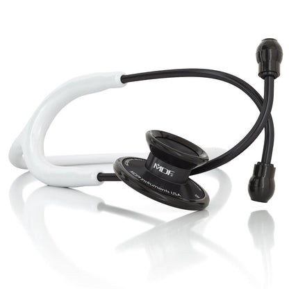 Acoustica MDF Instruments white and black stethoscope with dual-head chest piece and flexible tubing, designed for medical professionals.