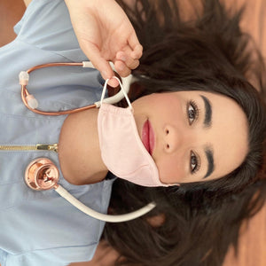 MD One® adult stethoscope in white with rose gold accents, featuring flexible tubing and dual-head chest piece for medical professionals.
