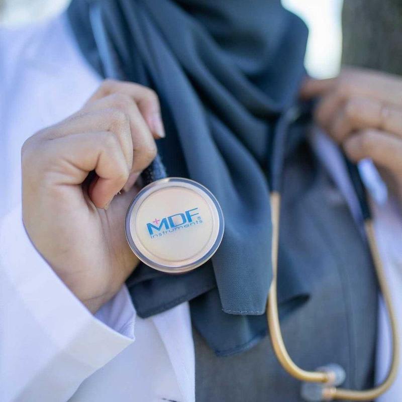 MDF Instruments ProCardial titanium adult cardiology stethoscope with black glitter finish and gold accents, shown with carrying case