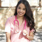 Pink glitter MDF Instruments ProCardial titanium adult cardiology stethoscope with rose gold accents and matching case, shown on a flat surface.